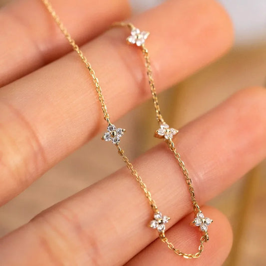 Exquisite 925 Sterling Silver Bracelet – 18K Gold-Plated with Shimmering Zircon Flowers